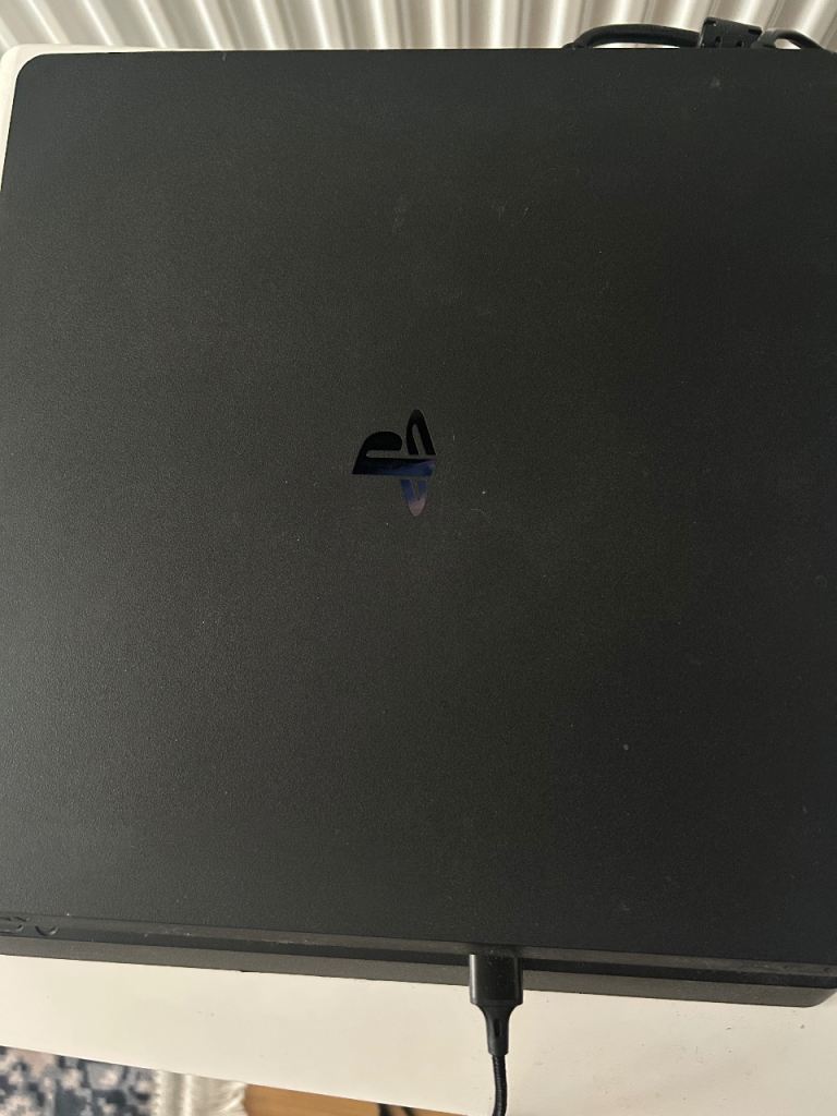 Sony PS4 Slim Disc Edition Console with 2 Controllers & 16 Games
