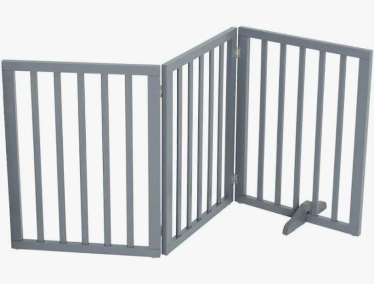 A new still boxed grey finish wooden 3 panal pet gate with feet it 