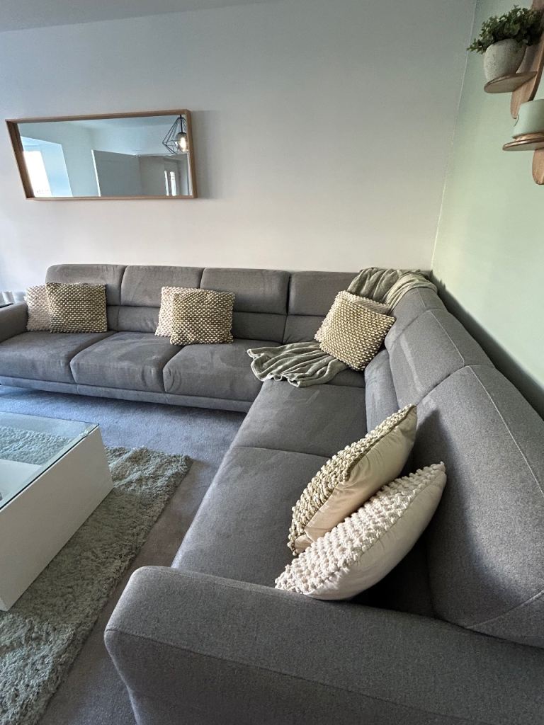 Natuzzi Gray corner material sofa