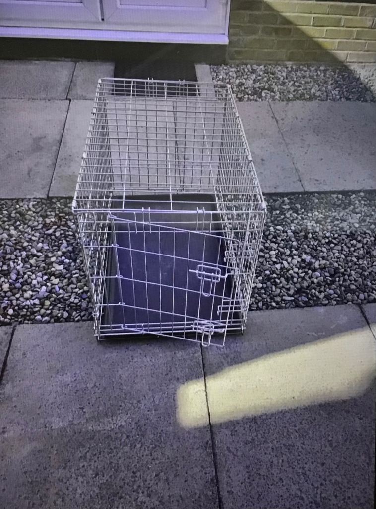 Dog crate with plastic inner tray, 2 opening lockable doors. Metal. Medium size. Hardly used. 