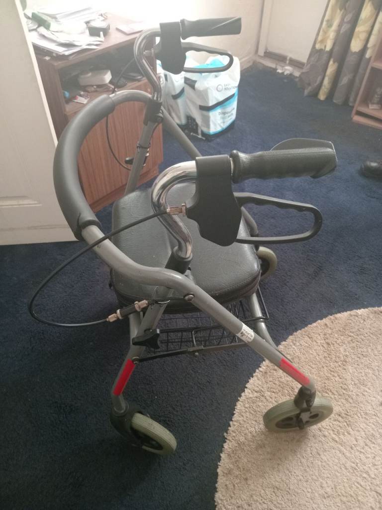 Rollator and seat