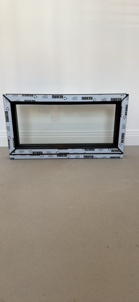 Double glazed window in black ash