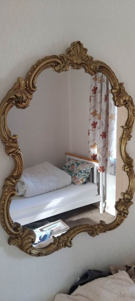 Beautiful gold coloured mirror