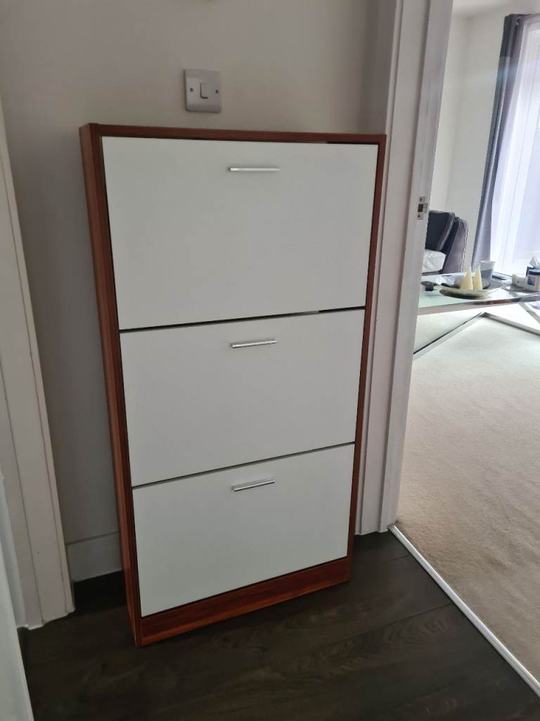 Shoe cabinet nearly new  Great condition  Dark brown and white