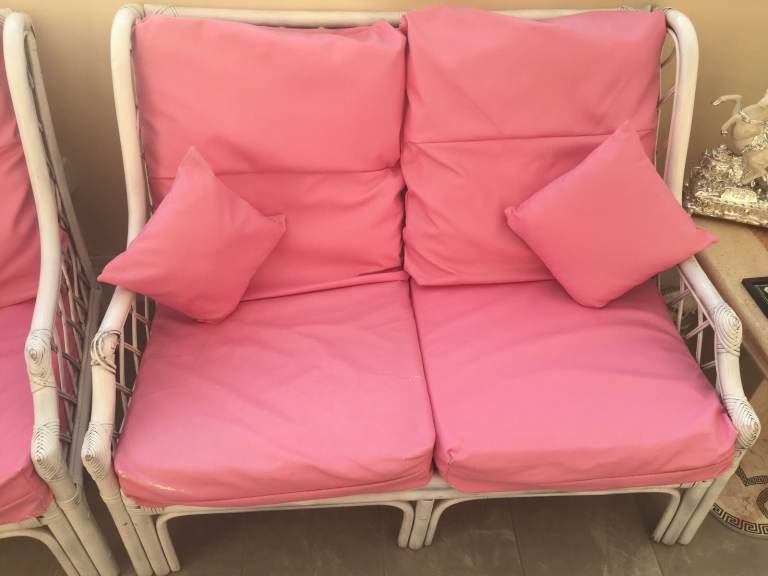 White 2-Seater Sofa and two chairs with Pink Cushions – Fair Condition