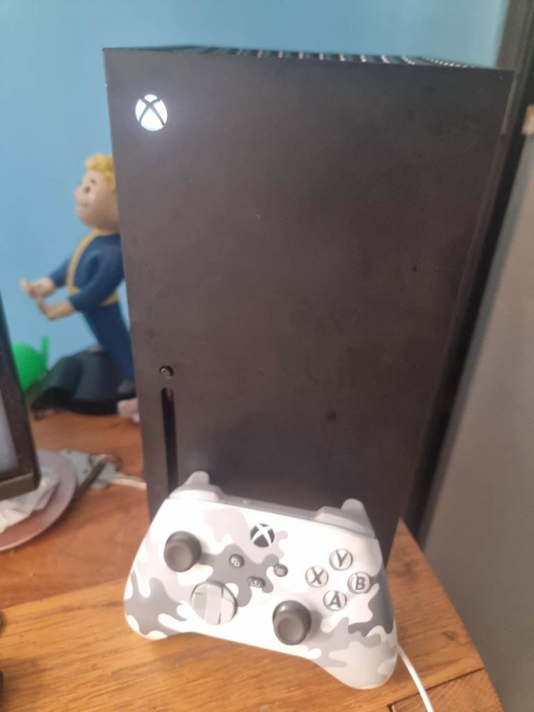 Xbox series x with controller and headset and warranty