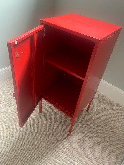 Red metal storage locker