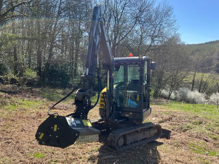 Mini Digger and flail mower work