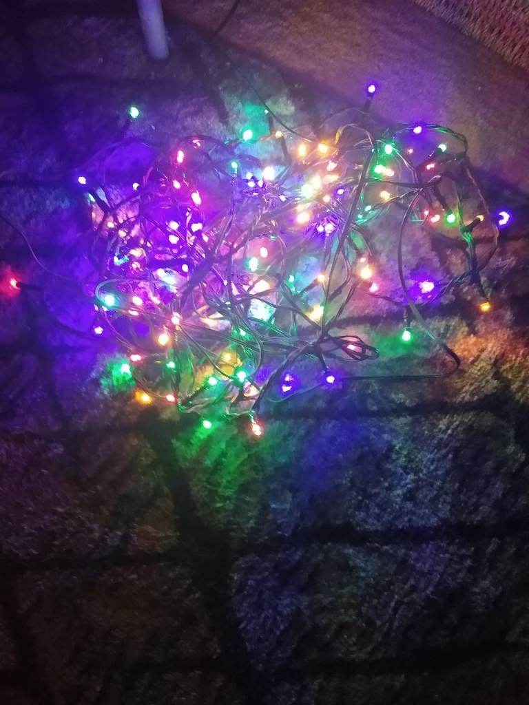 B&Q 6'6"Green Christmas tree with coloured lights (other decorations not included)