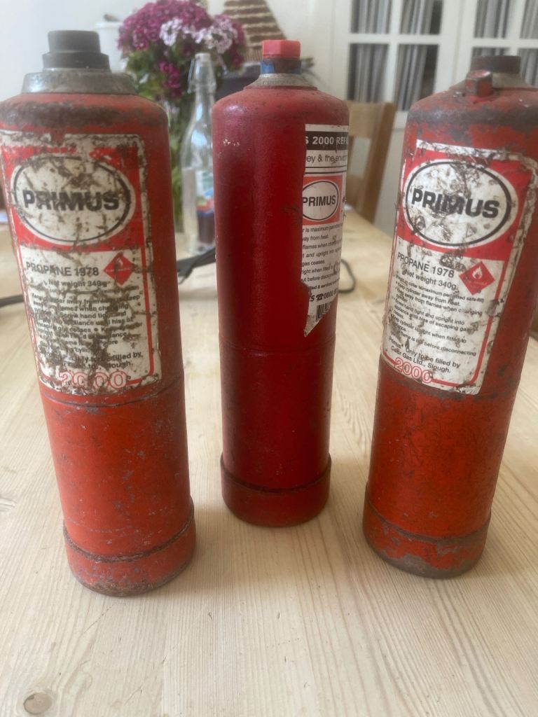 3 Primus gas bottles 1 full