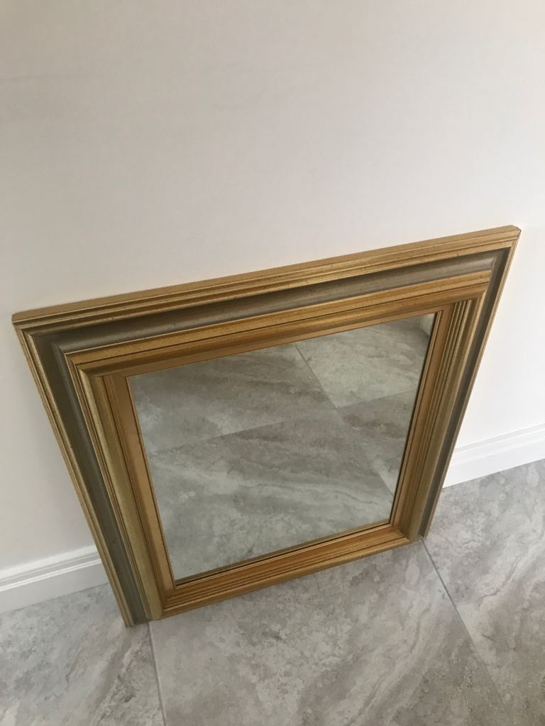 Gold designer framed wall mirror 