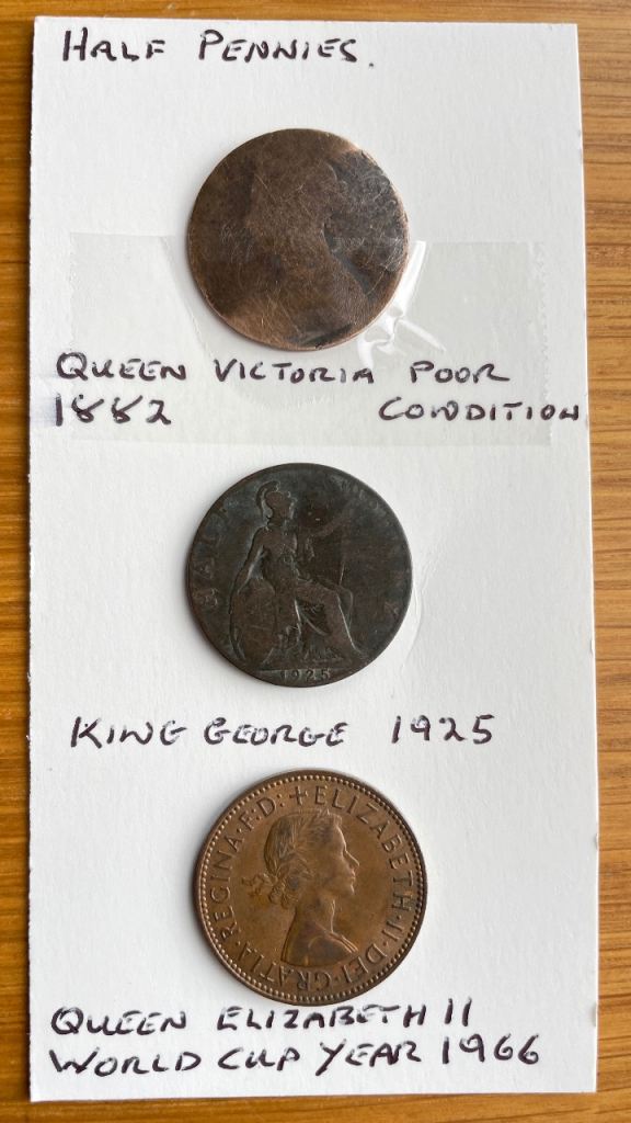 Old English Halfpenny coins. 