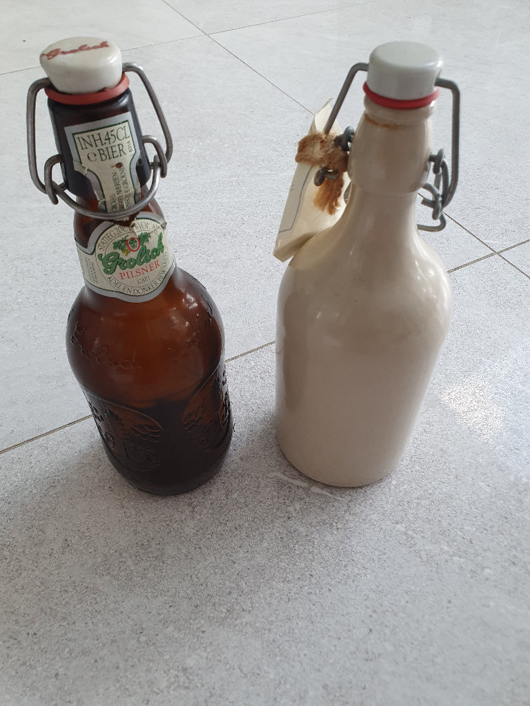Vintage Grolsch and stoneware bottles