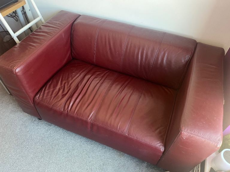 Small burgundy sofa