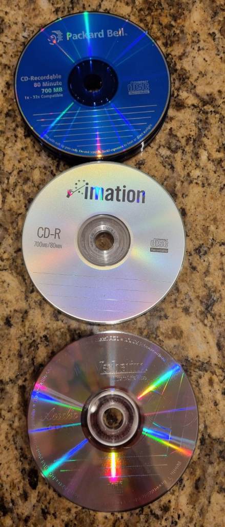 Free to take away - assorted blank/unused CD-Rs, CD-RWs, DVD+Rs (incl. some dual layer) and DVD+RWs