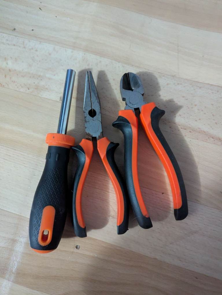 Side cutters, needle-nose pliers, hex-shank screwdriver