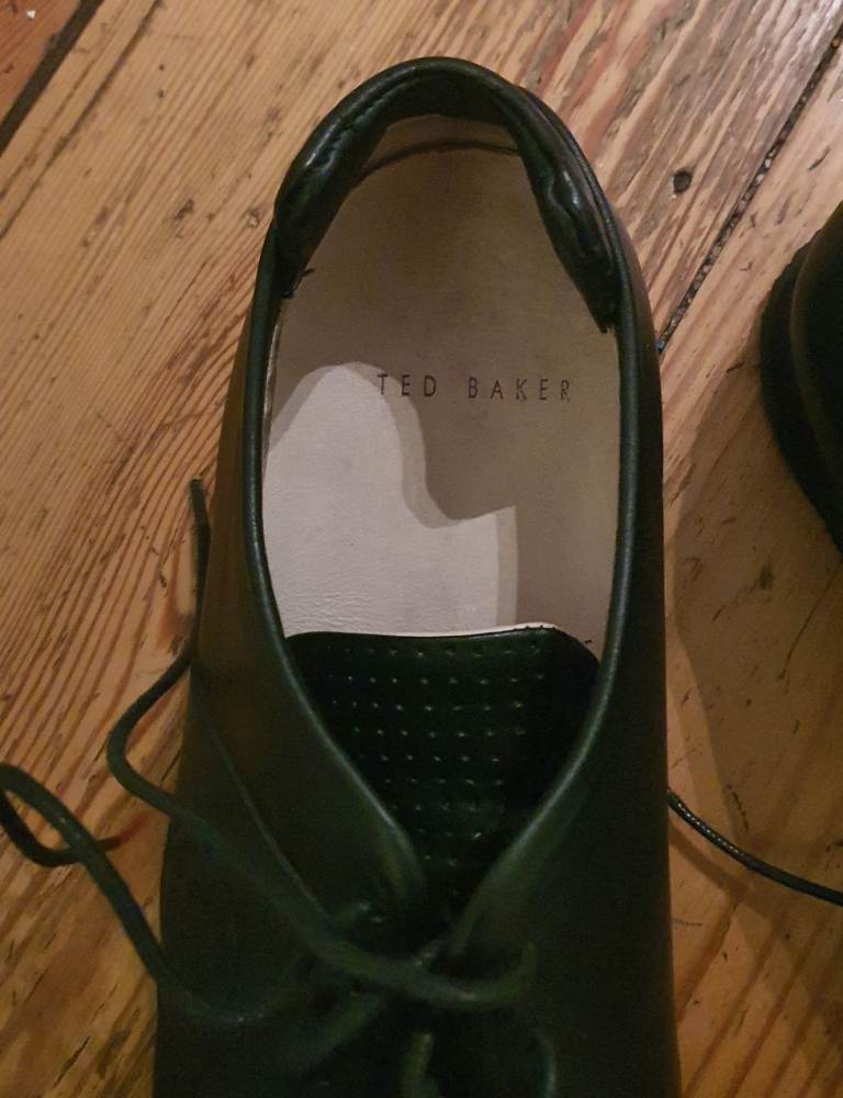 For sale is a pair of Ted Baker black shoes, size UK9