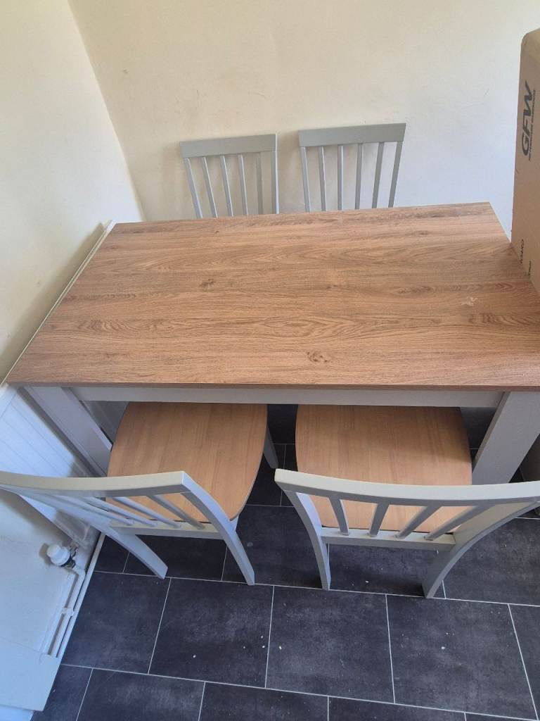 Table and 4 chairs  legs are off now 