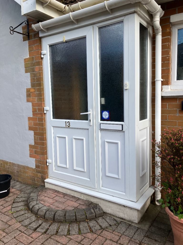 PVC white door and fitted porch