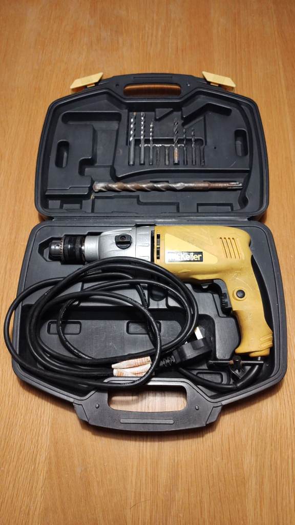 Large Wired Power Drill (1050 Watts) and 3/4 Inch Masonry Bit