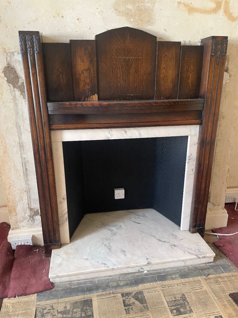 Art deco wooden fireplace surround and marble hearth 