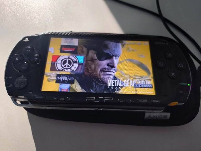 image for PSP 1003 with OSTENT battery, USB DATA cable & 64gb memory card.