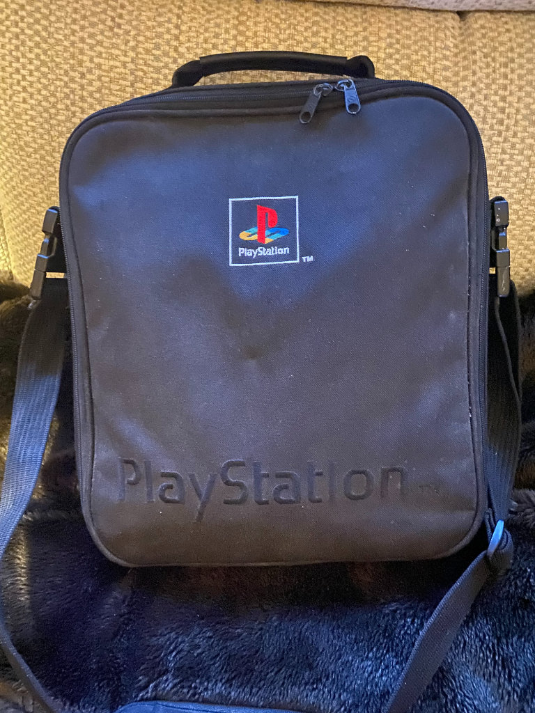 Sony Playstation One Console with Rare Limited Edition Playstation Messenger Bag.Charity benefit