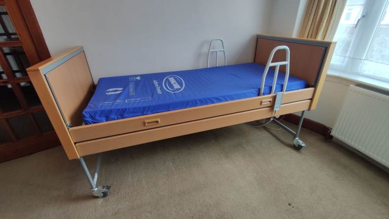 Invacare Medley Ergo profiling bed with Invacare Softform Premier pressure risk mattress