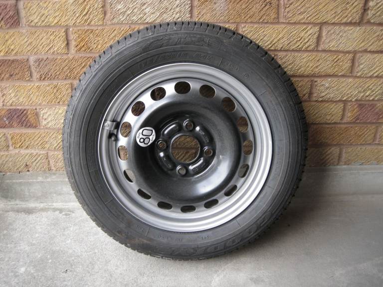 New unused Volvo spare tire,