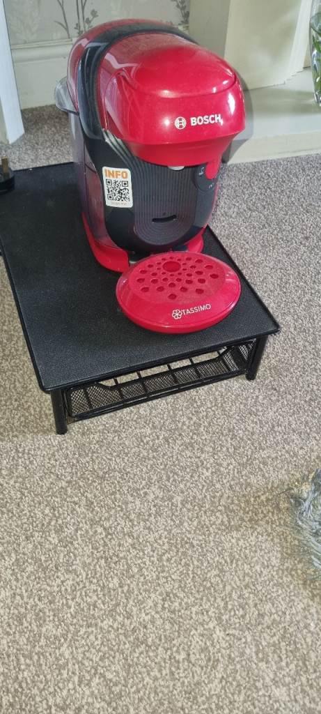 Red Bosch Tassimo coffee machine with storage drawer