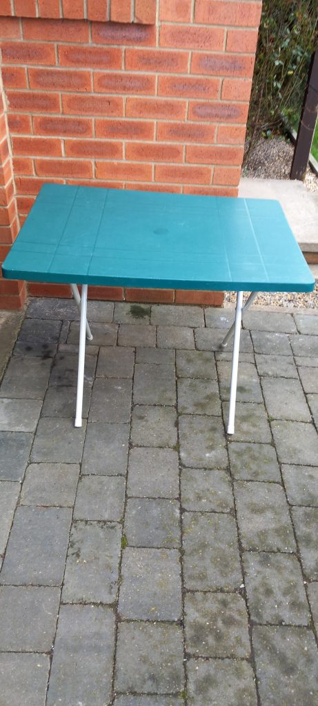 Foldable plastic table