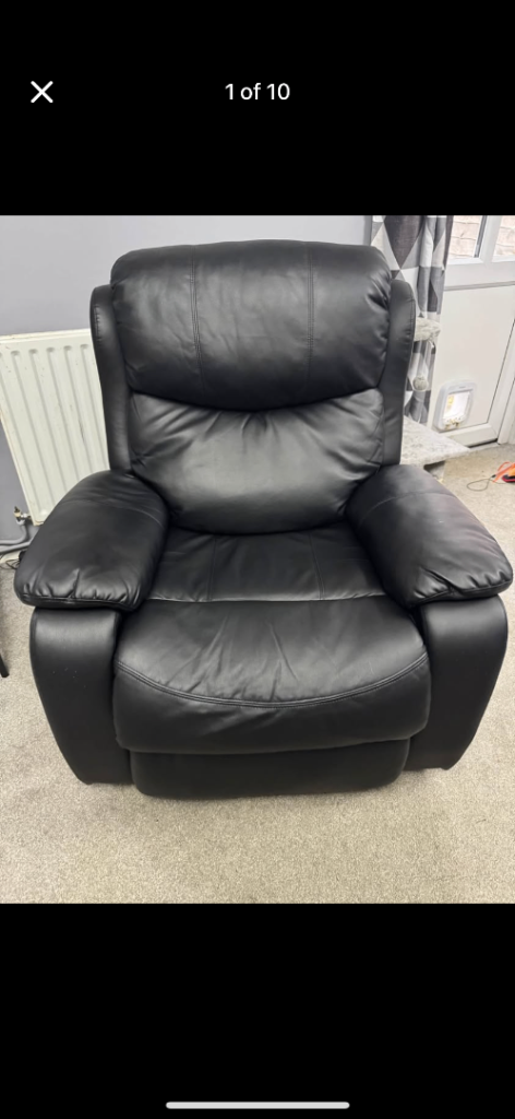 Black faux leather massaging recliner/rocking/swivel armchair 