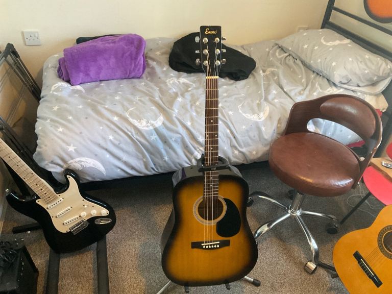 Encore Electro Acoustic Guitar with a 10 watt practice amplifier 