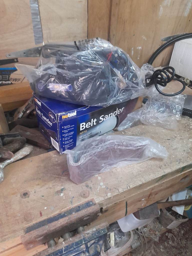 Brand new (boxed) 75mm wide belt sander complete with 6 belts & manual Sawdust collection bag