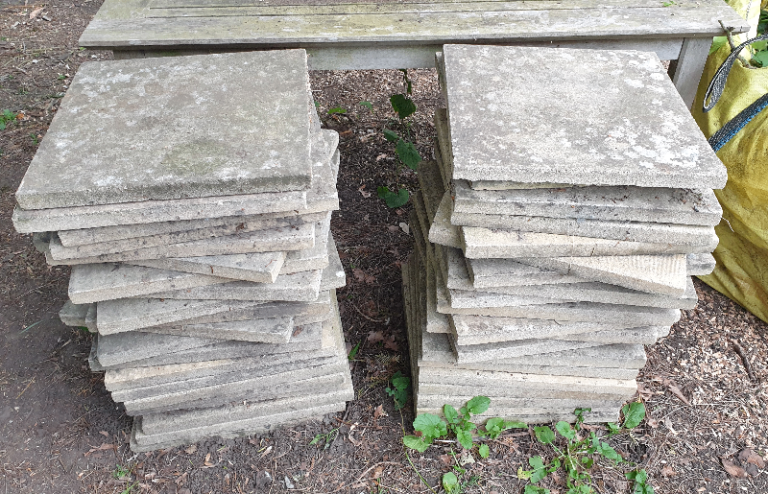 42 Paving stones / slabs yellow tint and weathered 44.6 cm square