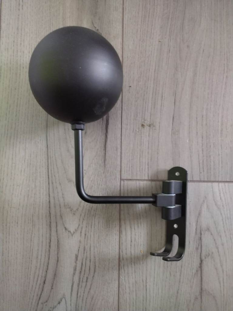 Motorcycle helmet holder 