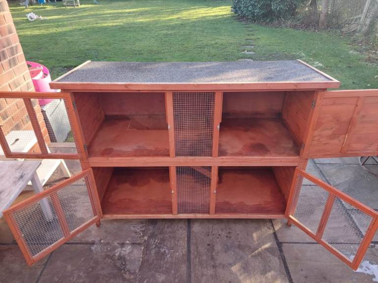 2 storey rabbit hutch. 4 doors. Really good condition