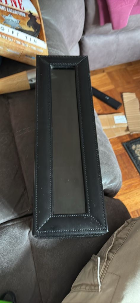 Black faux-leather watch storage box featuring a transparent viewing window, room for 6 watches