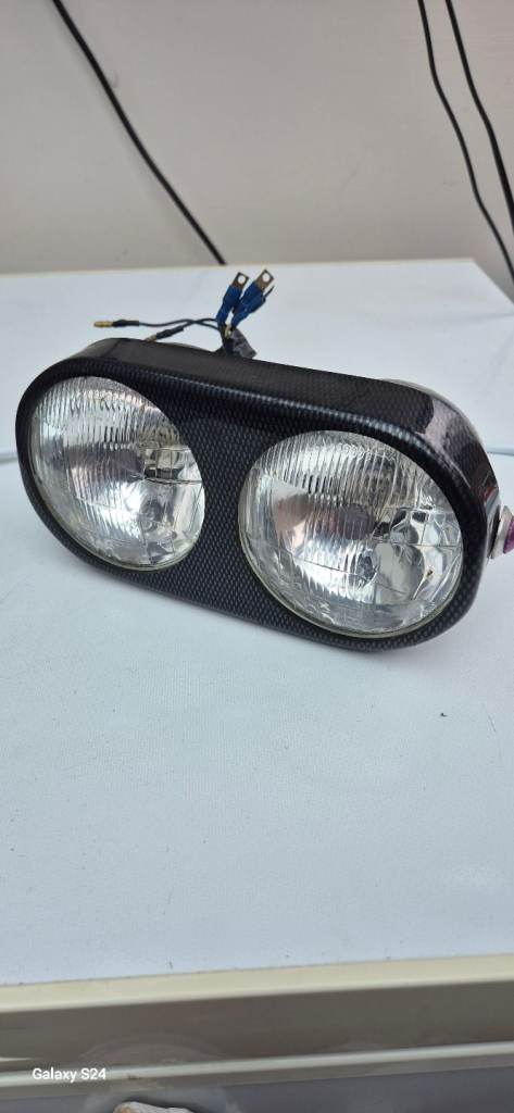 12v twin head lights used in good condition with age related marks see photos.