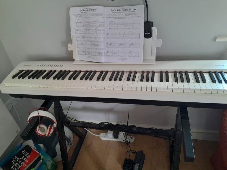 Roland FP-30 digital keyboard.