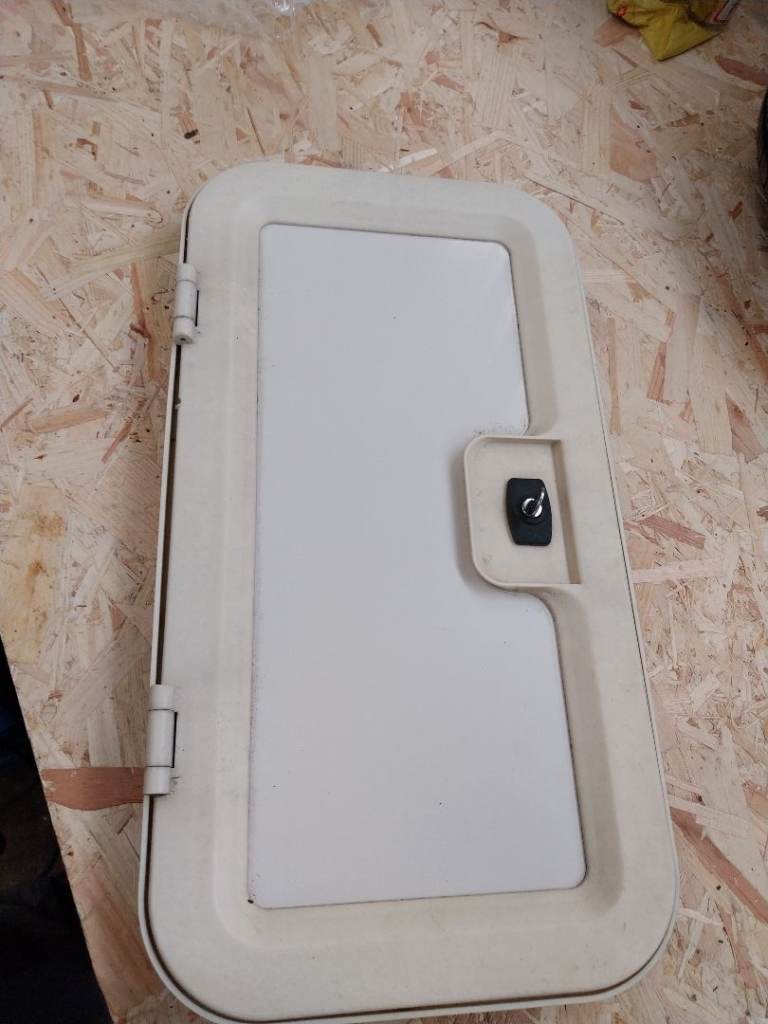 Caravan side locker door 