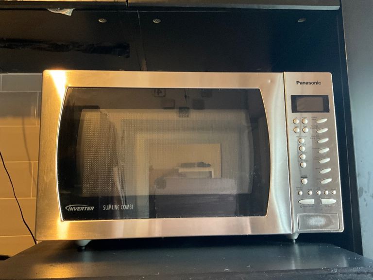 Silver and black Panasonic inverter slimine combi microwave and conventional oven 