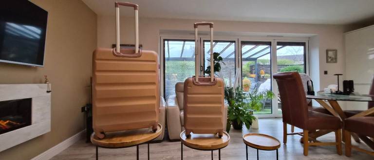 Aerolite Hard Shell Rose Bronze 28inch Brand New Suitcase together with FREE used cabin case.