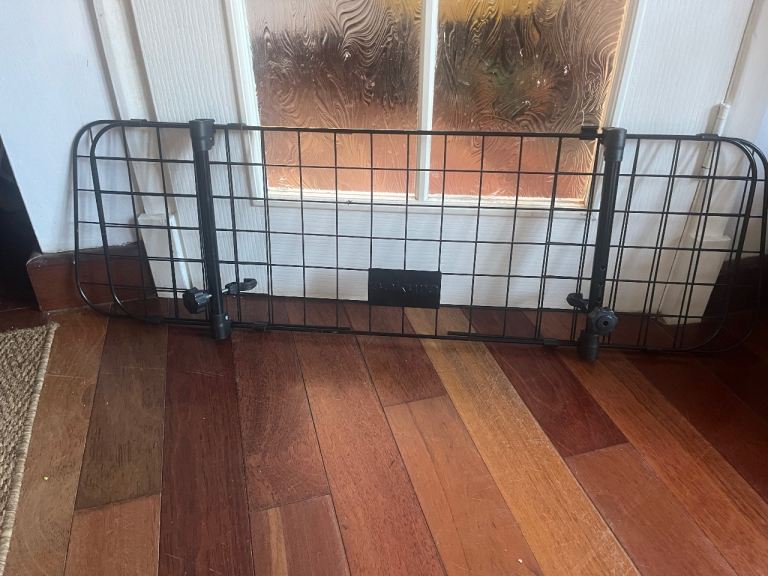 Universal vehicle dog guard