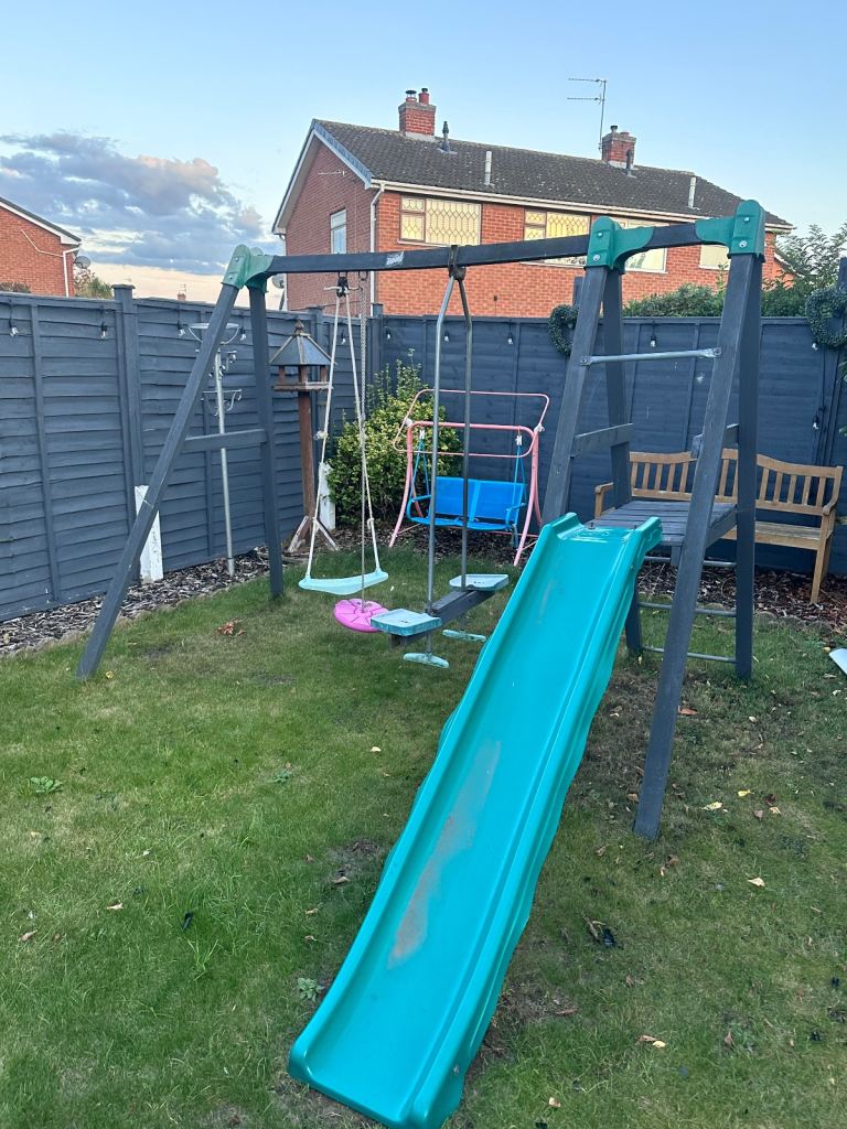 Children climbing frame with slide and 3 swings