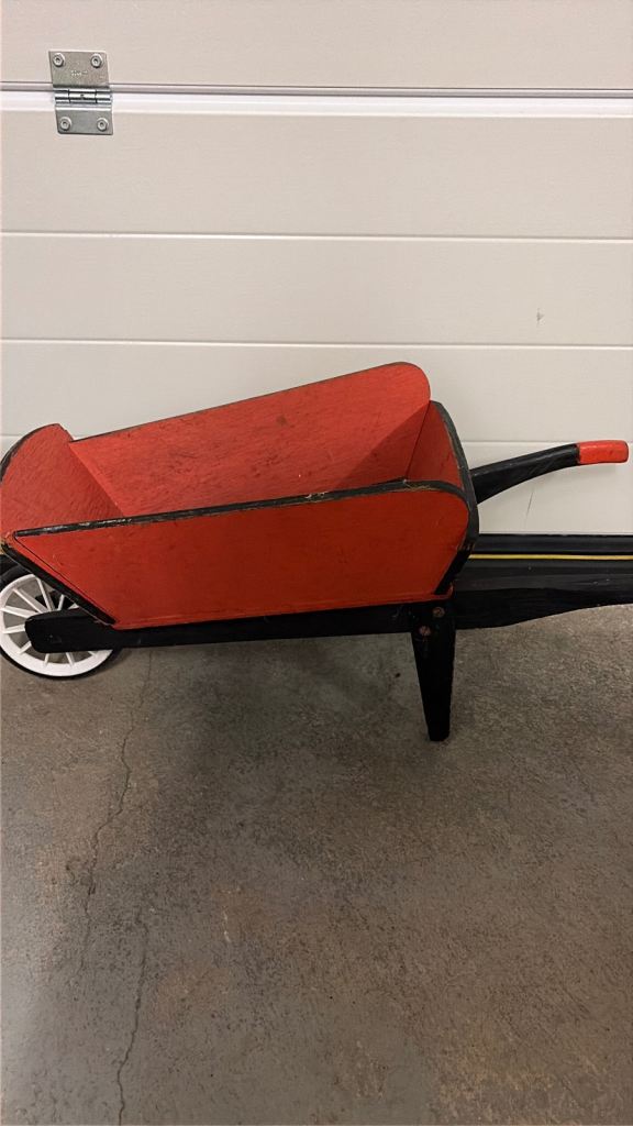 Child’s wooden wheelbarrow 
