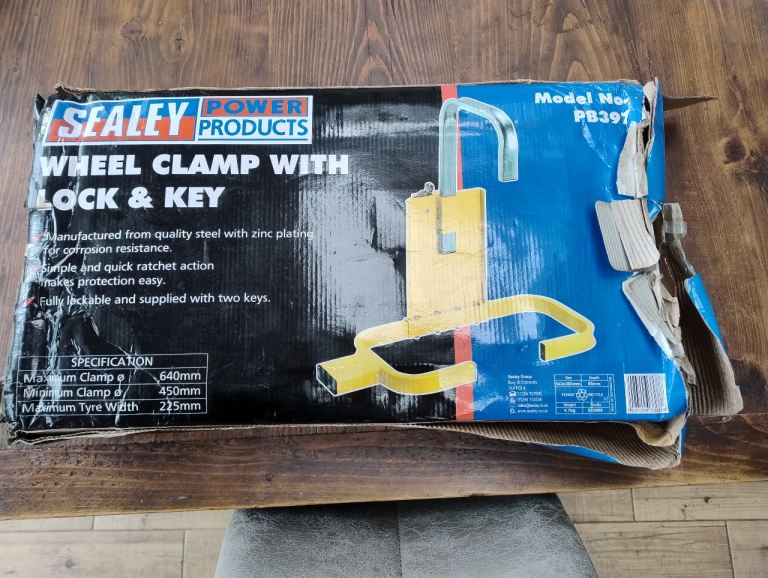 Never used new in the box sealey wheel clamp 