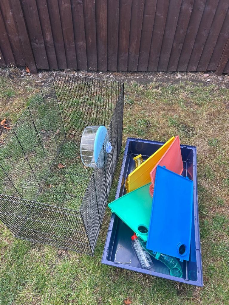 Hamster cage with silent wheel and tunnels. 