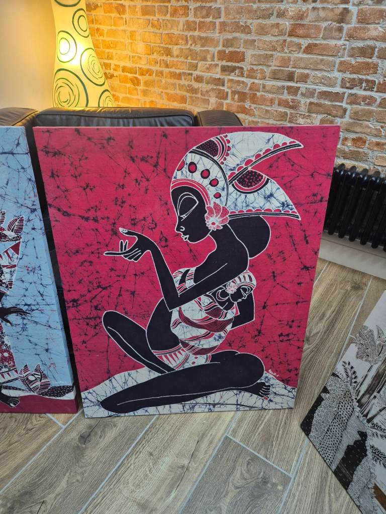 Four batik pictures on wooden frames