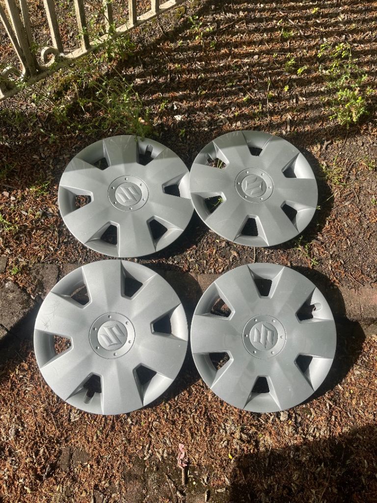 4 GENUINE Suzuki hubcaps 15 Inch